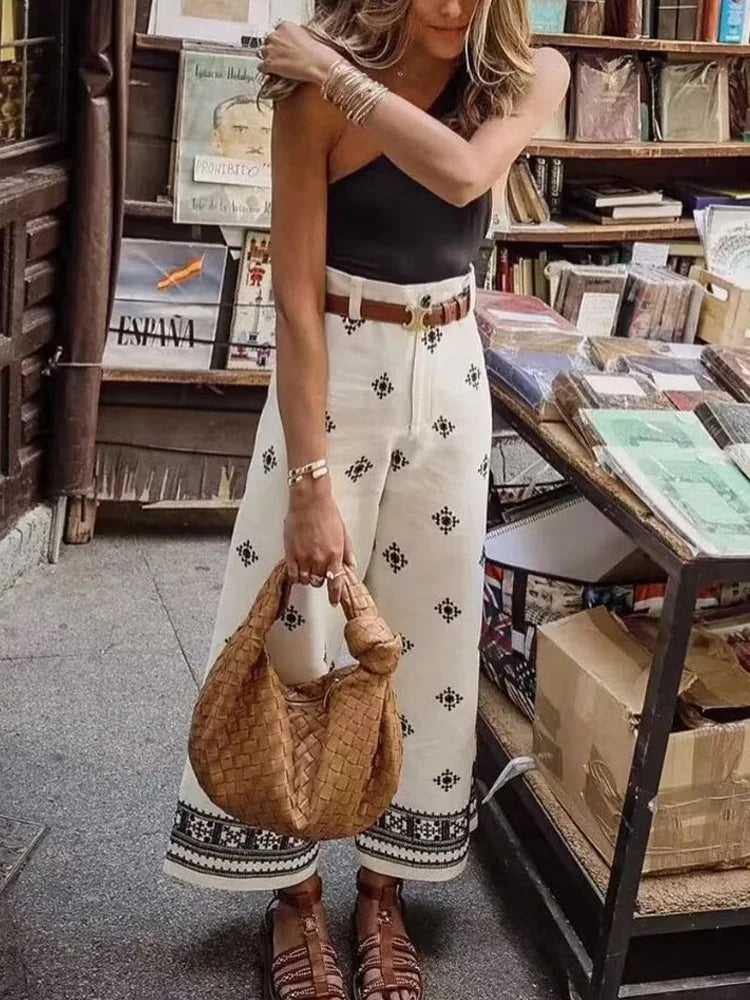 calça de linho feminina, calça feminina bordada, calça feminina elegante, calça de linho casual, calça feminina com bordado geométrico, calça feminina cintura alta, calça feminina até o tornozelo, calça de linho confortável, calça feminina sofisticada, calça feminina moderna