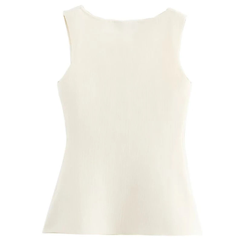 colete feminino de linho, colete feminino elegante, colete feminino sofisticado, colete feminino casual chic, colete feminino para escritório, colete feminino moderno, colete feminino com abotoamento frontal, colete feminino para dias quentes, colete feminino versátil