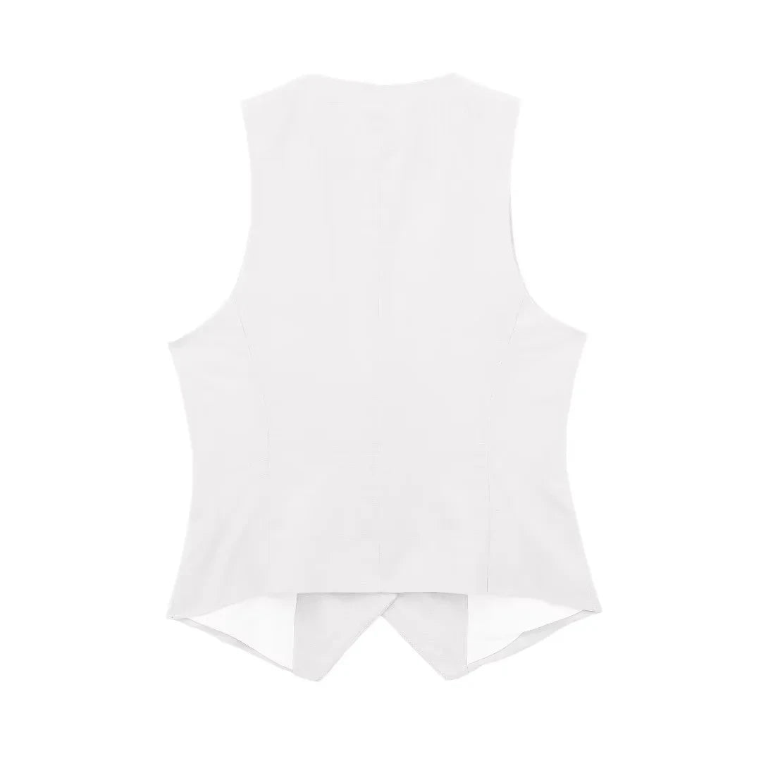 colete feminino de linho, colete feminino elegante, colete feminino sofisticado, colete feminino casual chic, colete feminino para escritório, colete feminino moderno, colete feminino com abotoamento frontal, colete feminino para dias quentes, colete feminino versátil