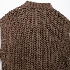 colete de tricô bustier, colete feminino estilo bustier, colete feminino slim fit, colete feminino elegante, colete feminino curto, colete feminino com abotoamento frontal, colete feminino confortável, colete feminino sofisticado, colete feminino moderno, colete feminino para outono inverno