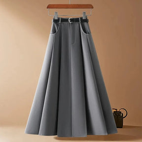 saia feminina midi, saia midi elegante, saia feminina para escritório, saia midi com zíper, saia feminina sofisticada, saia midi corte em A, saia feminina para trabalho, saia feminina versátil, saia midi para primavera verão, saia feminina casual chic