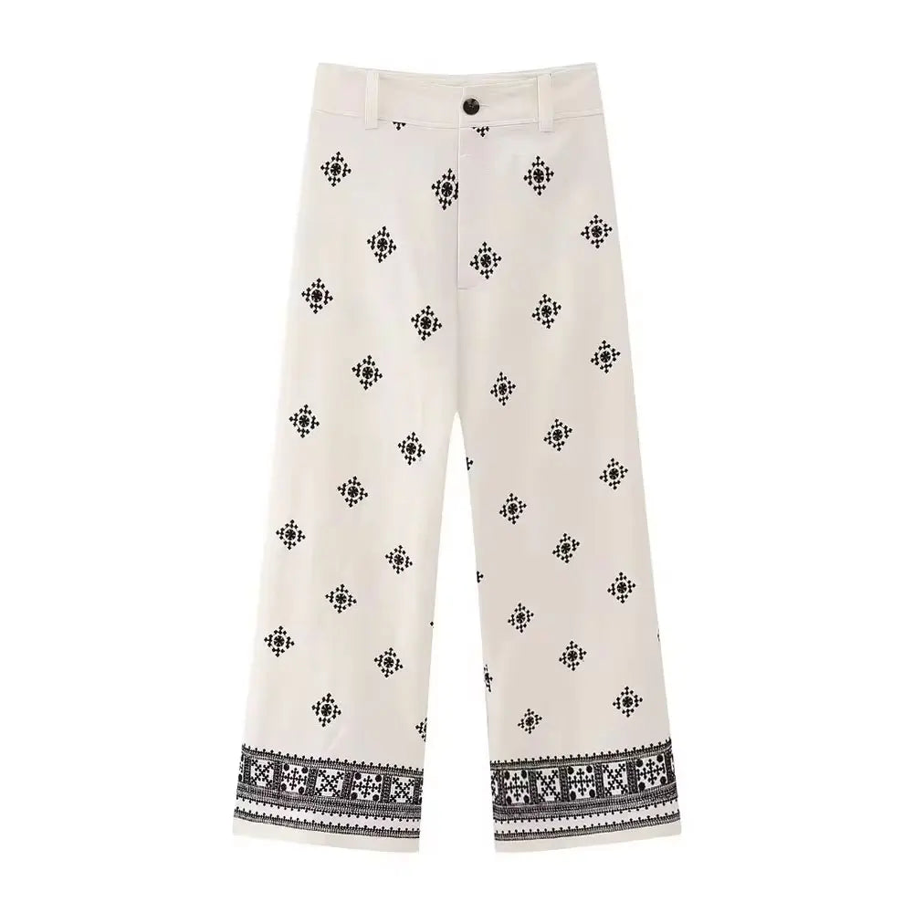 calça de linho feminina, calça feminina bordada, calça feminina elegante, calça de linho casual, calça feminina com bordado geométrico, calça feminina cintura alta, calça feminina até o tornozelo, calça de linho confortável, calça feminina sofisticada, calça feminina moderna