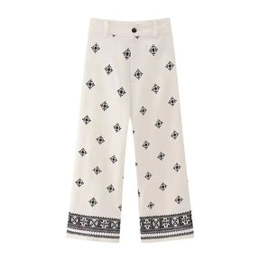 calça de linho feminina, calça feminina bordada, calça feminina elegante, calça de linho casual, calça feminina com bordado geométrico, calça feminina cintura alta, calça feminina até o tornozelo, calça de linho confortável, calça feminina sofisticada, calça feminina moderna