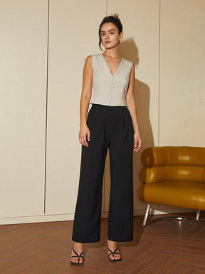 colete feminino de linho, colete feminino elegante, colete feminino sofisticado, colete feminino casual chic, colete feminino para escritório, colete feminino moderno, colete feminino com abotoamento frontal, colete feminino para dias quentes, colete feminino versátil