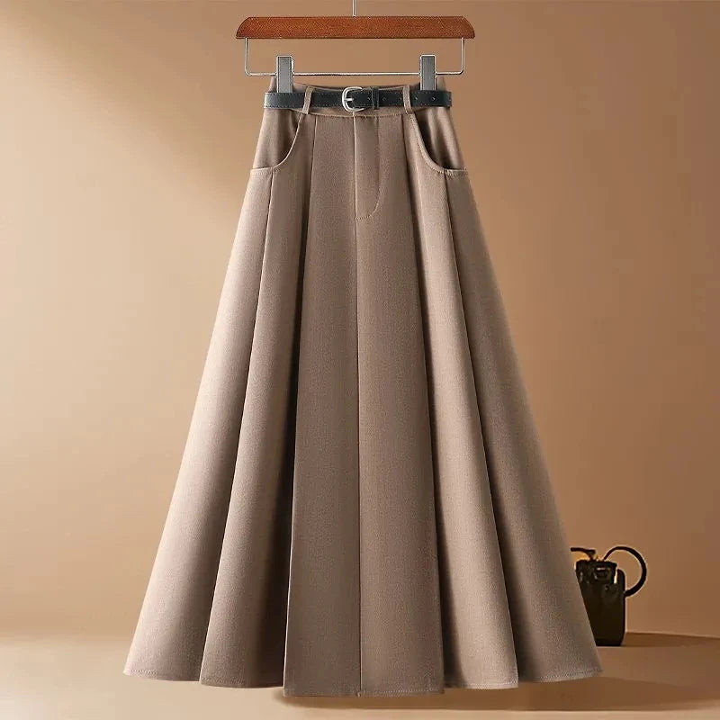 saia feminina midi, saia midi elegante, saia feminina para escritório, saia midi com zíper, saia feminina sofisticada, saia midi corte em A, saia feminina para trabalho, saia feminina versátil, saia midi para primavera verão, saia feminina casual chic