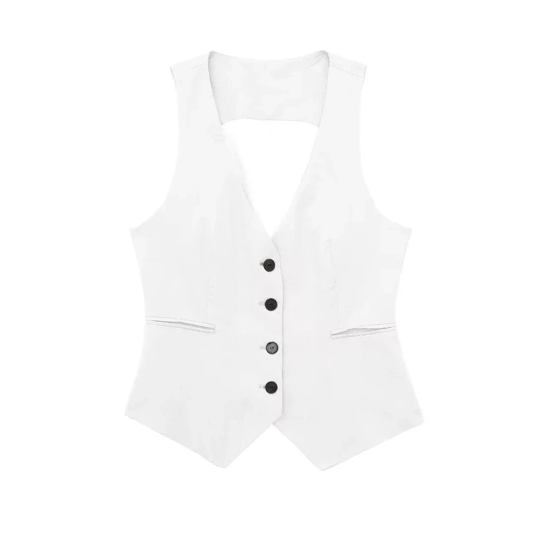 colete feminino de linho, colete feminino elegante, colete feminino sofisticado, colete feminino casual chic, colete feminino para escritório, colete feminino moderno, colete feminino com abotoamento frontal, colete feminino para dias quentes, colete feminino versátil