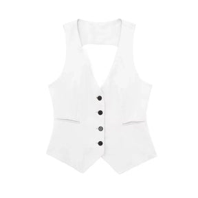 colete feminino de linho, colete feminino elegante, colete feminino sofisticado, colete feminino casual chic, colete feminino para escritório, colete feminino moderno, colete feminino com abotoamento frontal, colete feminino para dias quentes, colete feminino versátil