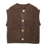 colete de tricô bustier, colete feminino estilo bustier, colete feminino slim fit, colete feminino elegante, colete feminino curto, colete feminino com abotoamento frontal, colete feminino confortável, colete feminino sofisticado, colete feminino moderno, colete feminino para outono inverno