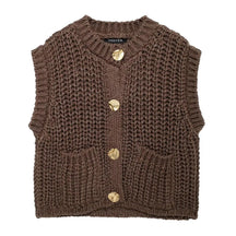 colete de tricô bustier, colete feminino estilo bustier, colete feminino slim fit, colete feminino elegante, colete feminino curto, colete feminino com abotoamento frontal, colete feminino confortável, colete feminino sofisticado, colete feminino moderno, colete feminino para outono inverno